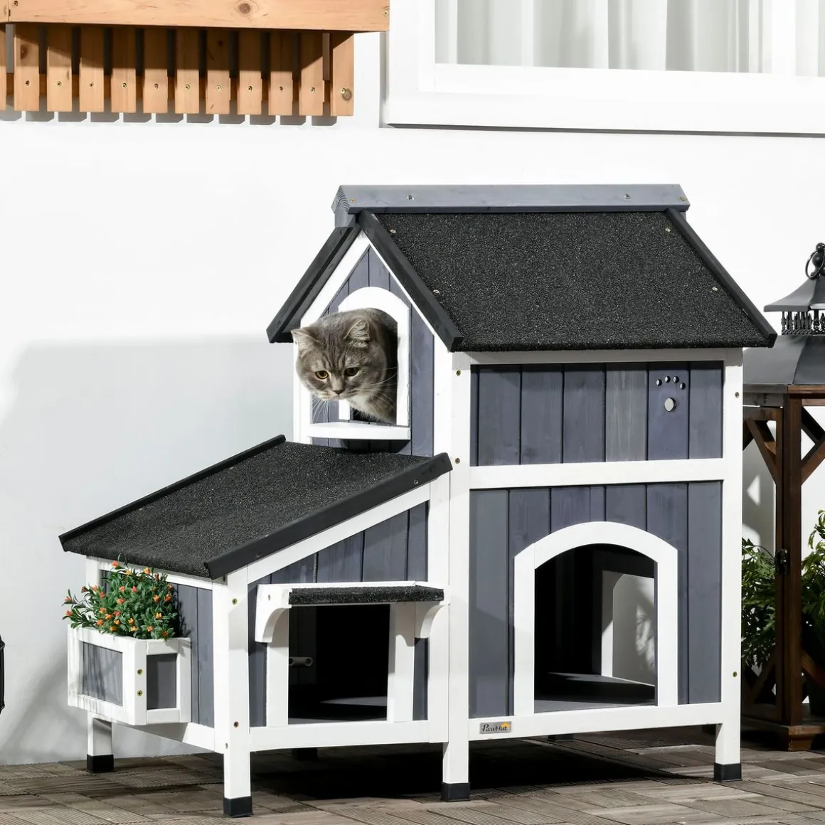 Caseta para gatos Cozy PawHut 1 puerta + 3 ventanas + macetero gris/blanco 85,5x96x65 cm