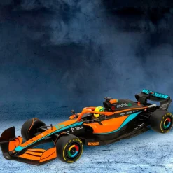 Coche teledirigido McLaren F1 MCL36 Rastar con mando +6A naranja 10x47x17 cm