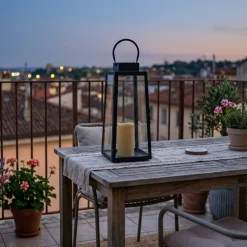 Farol solar con vela LED negro 45x18x18 cm